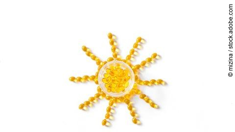 Sonne gelegt aus Vitamin-D-Kapseln